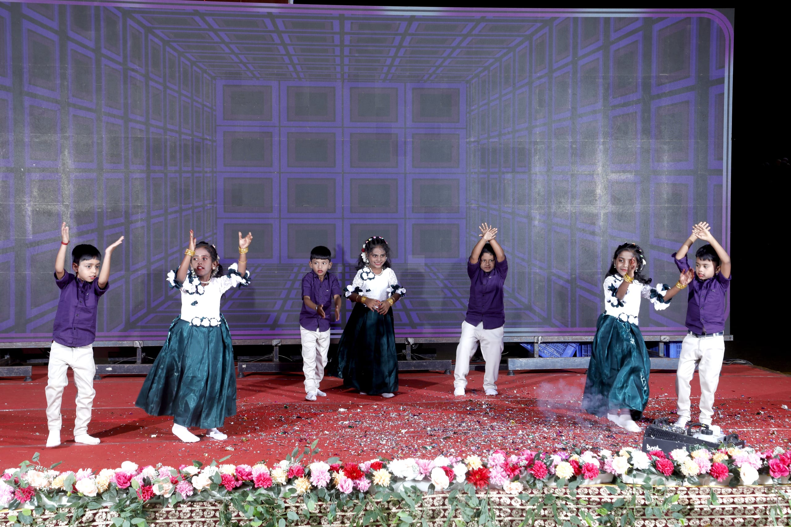 Students presenting during a stage program