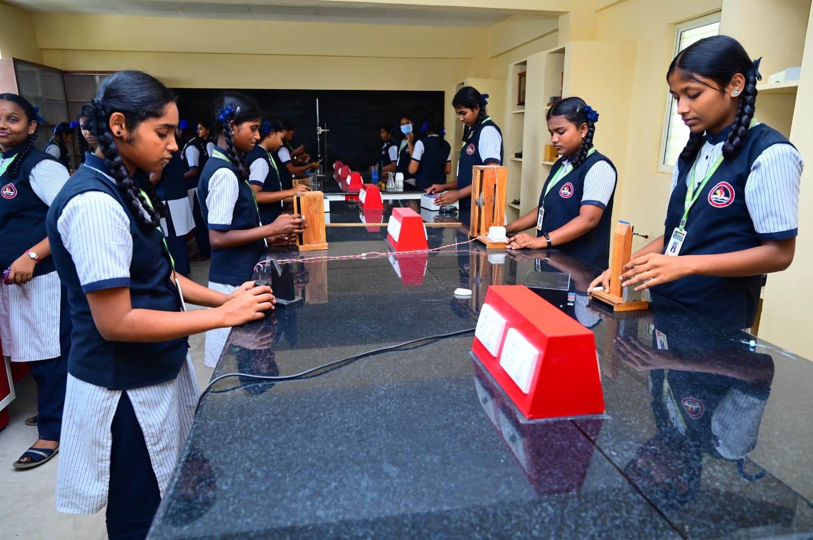 Students doing physics practicals in the laboratory