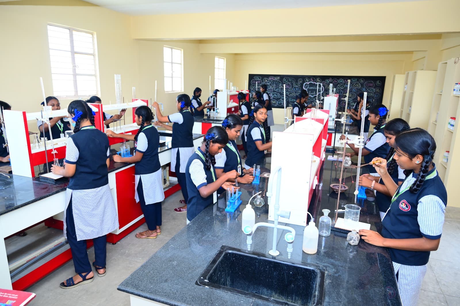 Students seated and working in a science laboratory
