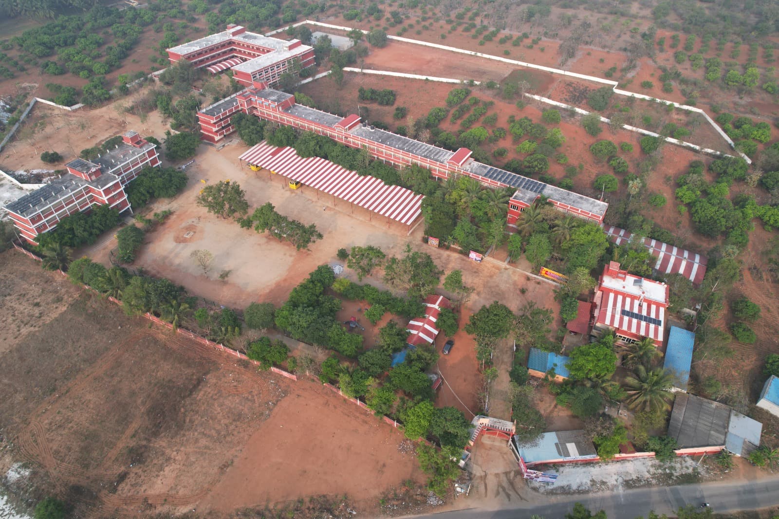Aerial view of the St. Kanakadasa campus surrounded by greenery