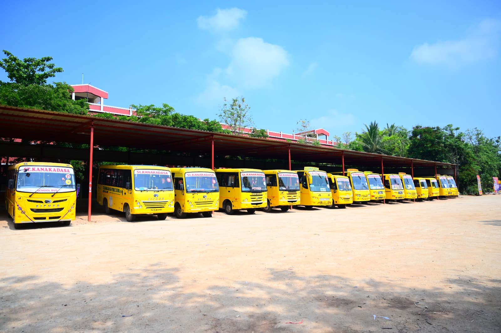 School transport buses parked on campus