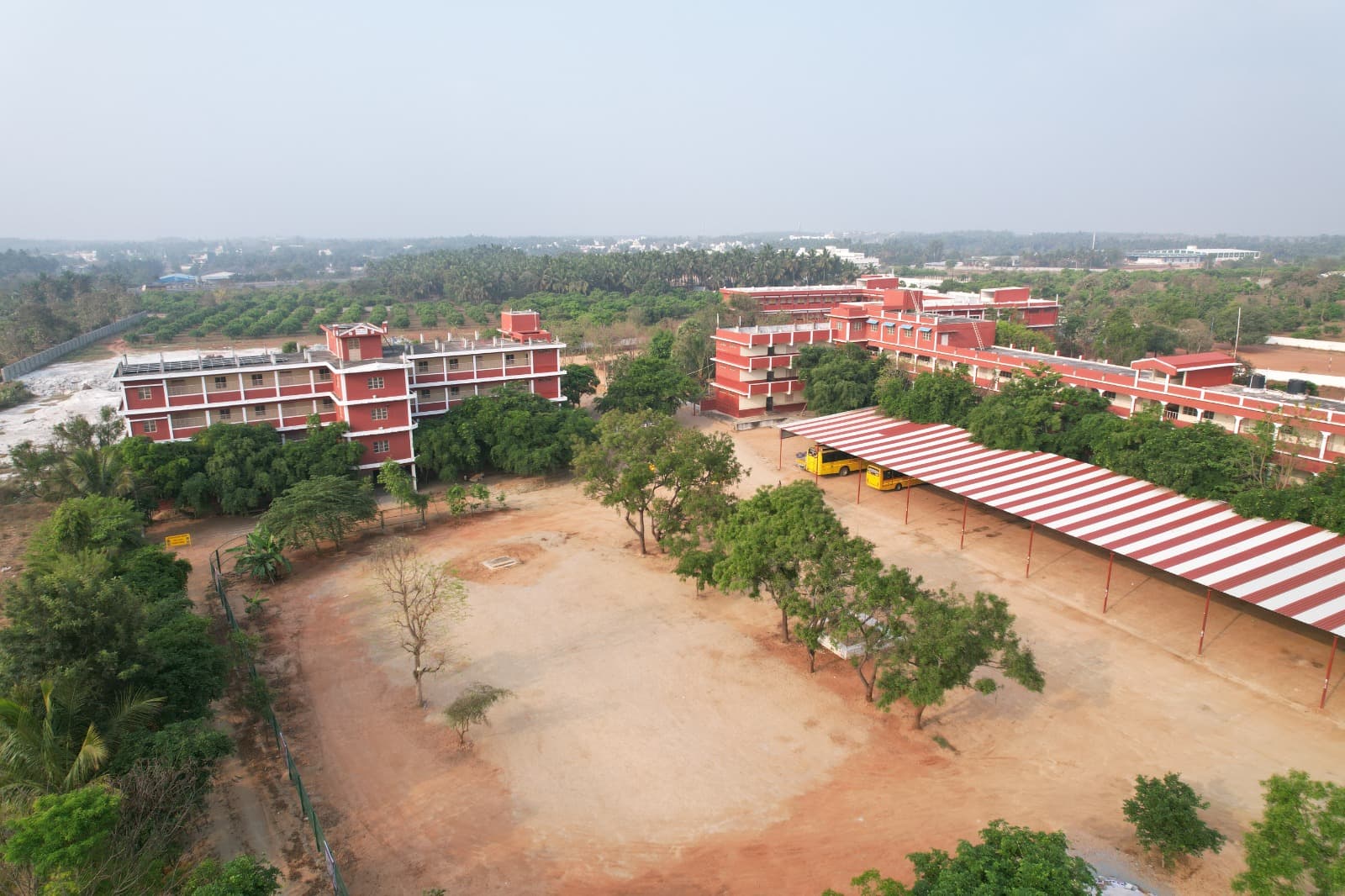 Aerial view of school building and open field